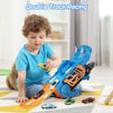 Thumbnail 3 de Shawe Dinosaurier Transporter Truck mit 6 Spielzeugautos 🚚