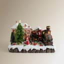 Thumbnail 1 de El Corte Inglés Pueblo con tren de regalos 57 luces 🎄