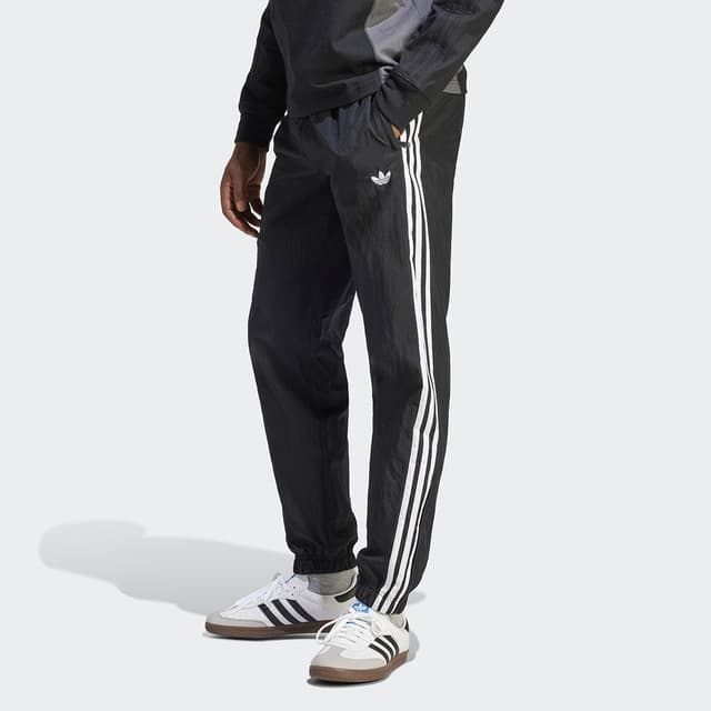 Imagen de adidas Rekive Woven Pantalón hombre Originals 👖 en OfertitasTOP