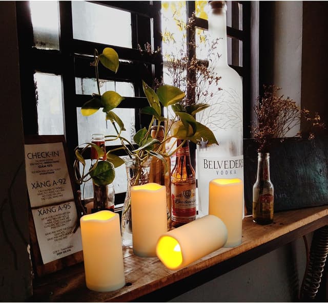 Detalle 2 de Biyanuo 2er-Set wasserdichte Outdoor LED-Kerzen mit Fernbedienung & Timer