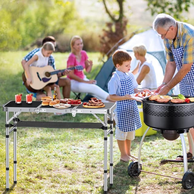 Detalle 2 de Anbte Folding Camping Table (Aluminium) with Storage Net, 3 adjustable heights