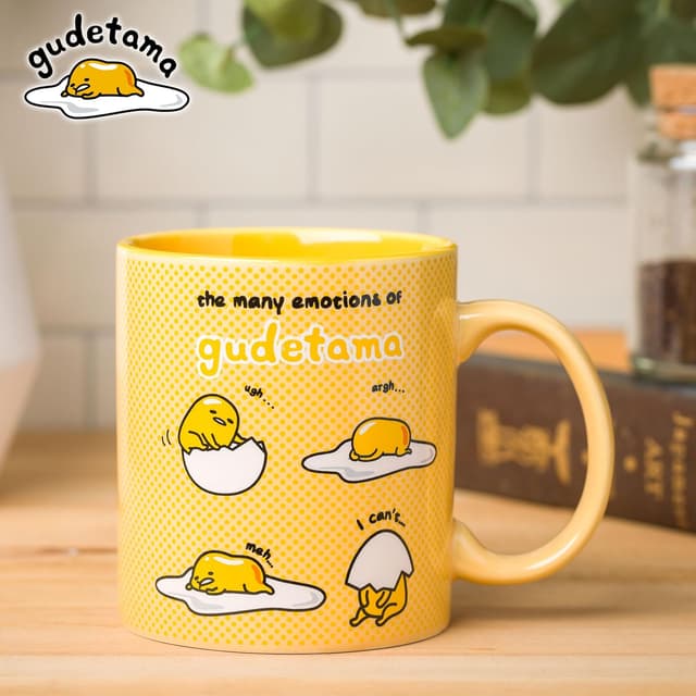Detalle de Silver Buffalo Sanrio Gudetama “The Many Emotions of Gudetama” Ceramic Mug (20 Ounces)
