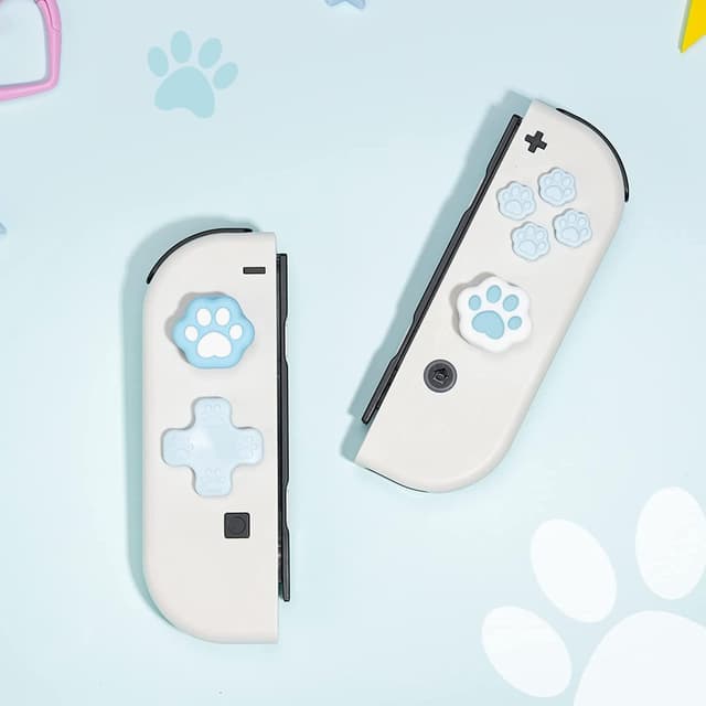 Detalle 2 de GeekShare Cat Paw Button Caps & Thumb Grips Set for Nintendo Switch/OLED (Blue)