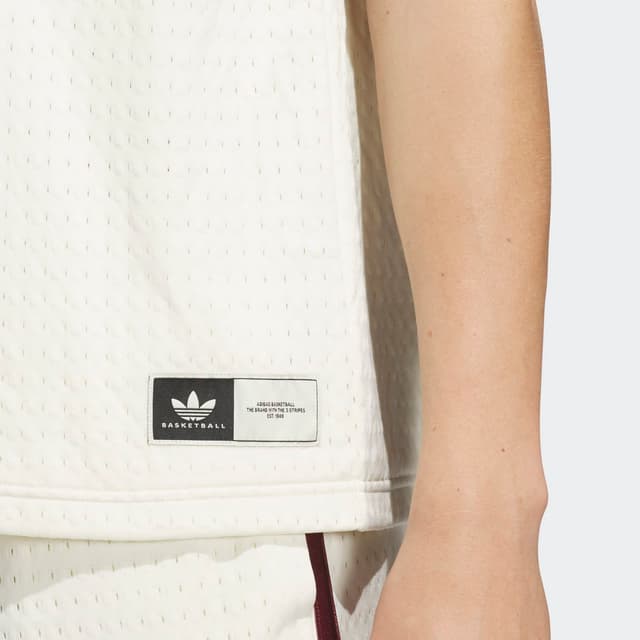 Detalle de adidas Originals camiseta de baloncesto de hombre en poliéster, ajuste holgado