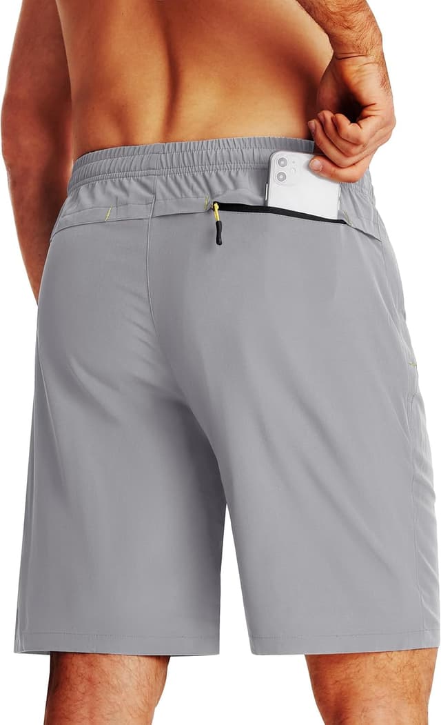 Detalle de TACVASEN men’s quick-drying training shorts with zip pockets