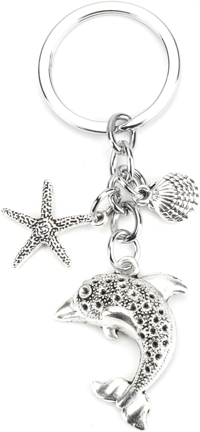 Detalle de OBEISN Moderner Schlüsselanhänger aus Edelstahl mit Muschel-, Schildkröte- und Krake-Anhänger