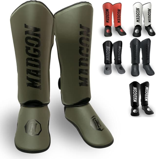 Detalle de MADGON Paratibie kick boxing e Muay Thai con imbottitura, protezione per tobillo e sacca