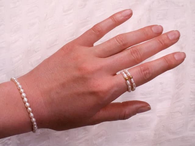 Thumbnail 4 de BERGERLIN Reis Perlen Ring mit Goldperle S M L