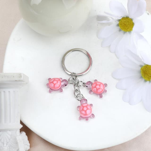 Detalle 1 de Tranbath Schlüsselanhänger süß Schildkröte – Deko-Charms als Partner-Geschenk für Freunde und Freundin