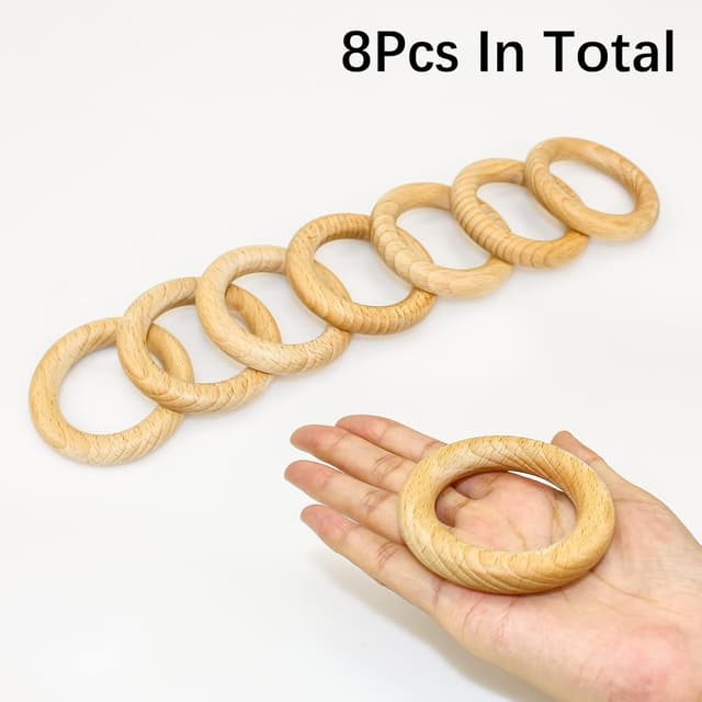 Detalle 2 de Ruby 8 Beißringe aus Buchenholz (Ø 7 cm) – Kauspielzeug & Bastelringe für Babys