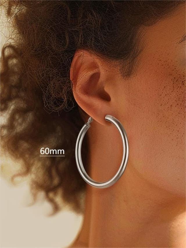 Detalle 2 de FindChic Créoles en acier inoxydable pour femme – boucles huggie argenté/doré/noir (20/30/40/60/80 mm)