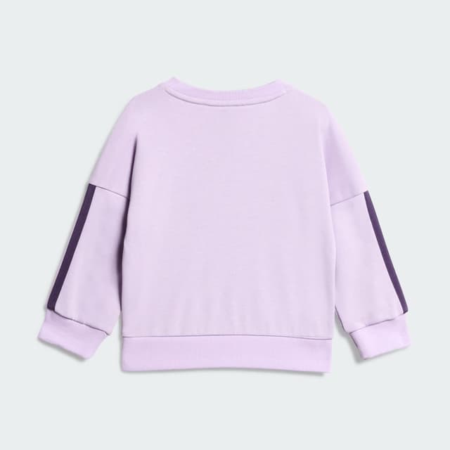Detalle de Adidas Essentials bebé violeta, conjunto sudadera
