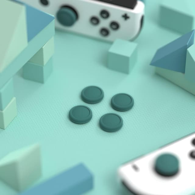 Detalle de eXtremeRate PlayVital silicone joystick caps (Hunter Green) for Switch OLED Joy‑Con