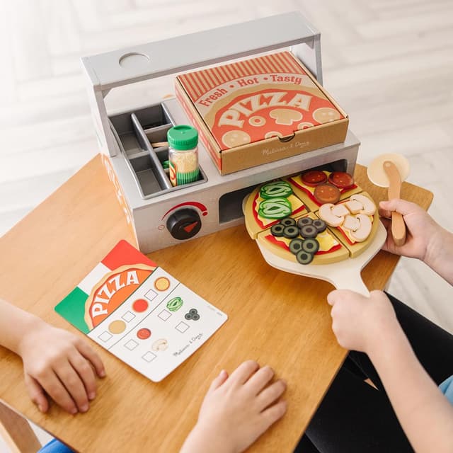 Detalle de Melissa & Doug Holz-Pizzeria (41-teilig) – Pizza-Set für Rollenspiel ab 3 Jahren