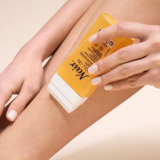 Detalle de Nair Roll-On Cire au Sucre au Lait & Miel – lot de 2 flacons de 100 ml + 2 x 10 bandes réutilisables