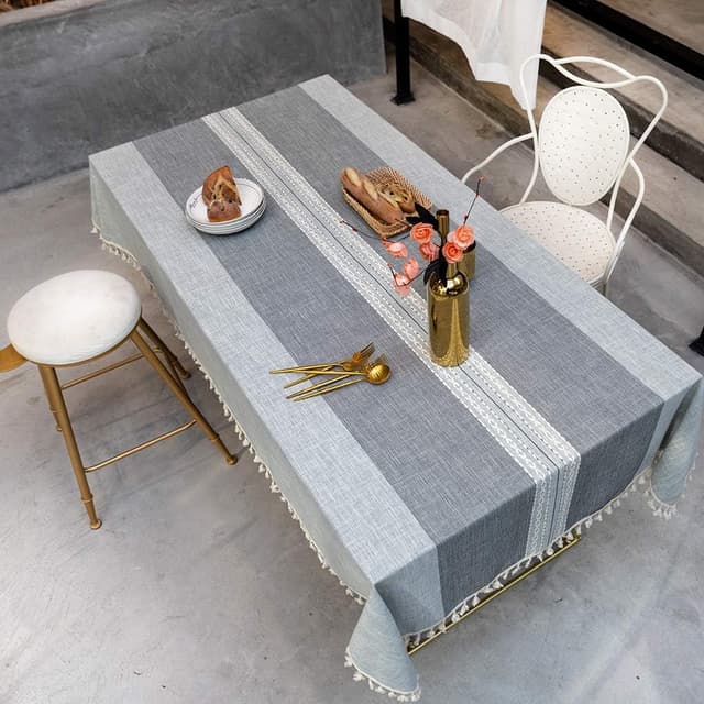 Detalle de SUNBEAUTY wipeable rectangular cotton-linen tablecloth (60% cotton, 40% linen) 140x240cm grey with tassels