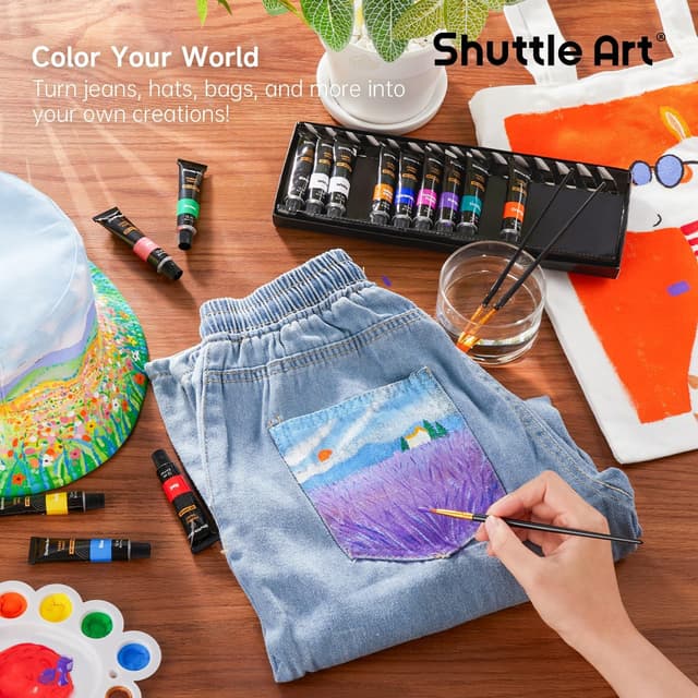 Detalle de Shuttle Art waschmaschinenfeste Textilfarbe (15 x 12 ml) im Set mit 3 Pinseln – zum Bemalen & Färben von Stoffen