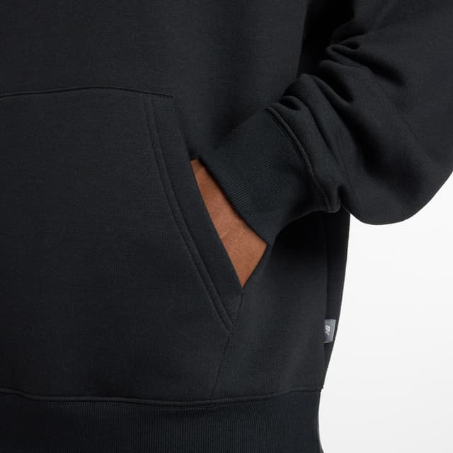 Detalle de New Balance sudadera con capucha Linear Graphic