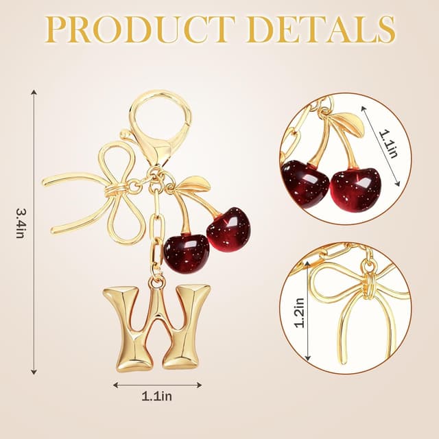 Detalle 2 de Snylcce Initial A keychain with bow & cherry charm in gold-plated metal