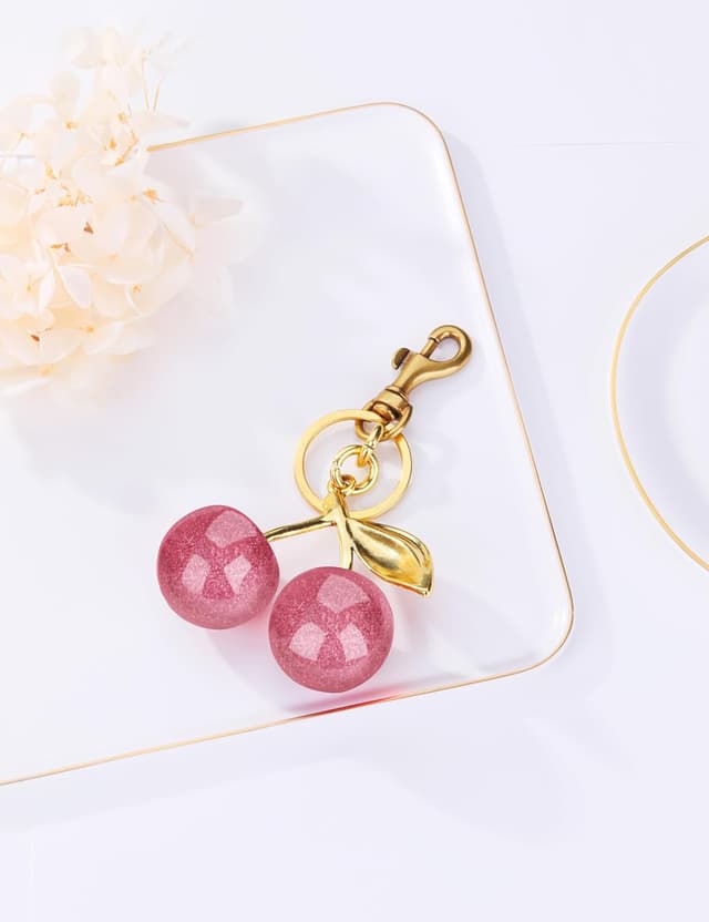 Detalle de OVRUNS Cherry Bag Charm for Women – cute cherry keychain & purse pendant for handbag, wallet and phone