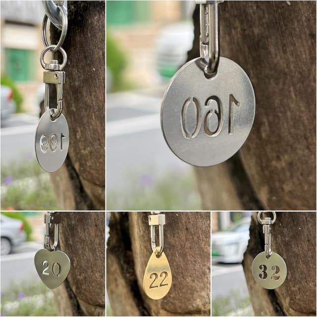 Detalle de NanTun numbered key tags 1–10 (25mm) in 304 stainless steel with split rings