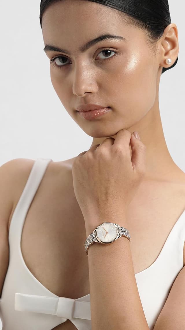 Detalle 2 de Montre Swarovski Attract Collection Swiss Made en acier inoxydable, PVD or champagne