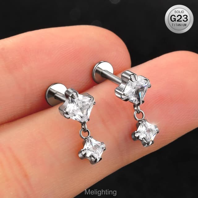 Detalle 1 de Melighting Orecchino elica titanio 16G zirconia