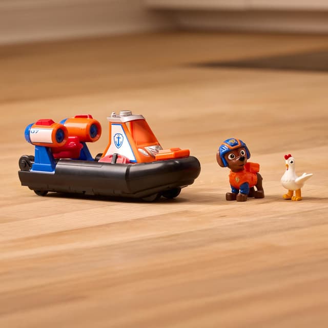 Detalle de Paw Patrol Search and Rescue Zuma Rescue Hovercraft Water Vehicle with Pull-Back Action and 2 Figures (Ages 3+)