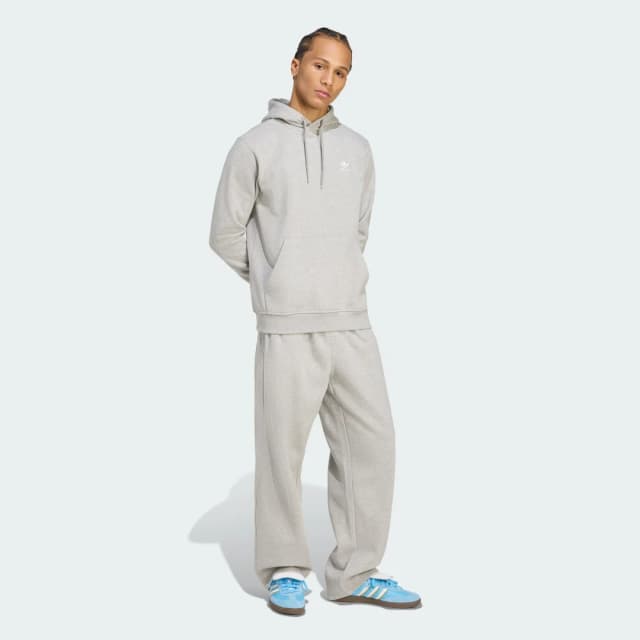 Detalle de Pantalón con dobladillo abierto Trefoil Essentials de adidas (gris)