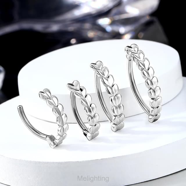 Thumbnail 1 de Melighting piercing ombelico cuore inverso in acciaio 316L