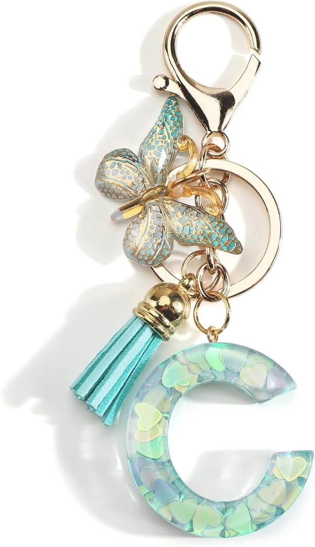 Detalle de OBEISN Buchstaben-Schlüsselanhänger mit Schmetterling & Quasten – kreativer Anhänger für Frauen