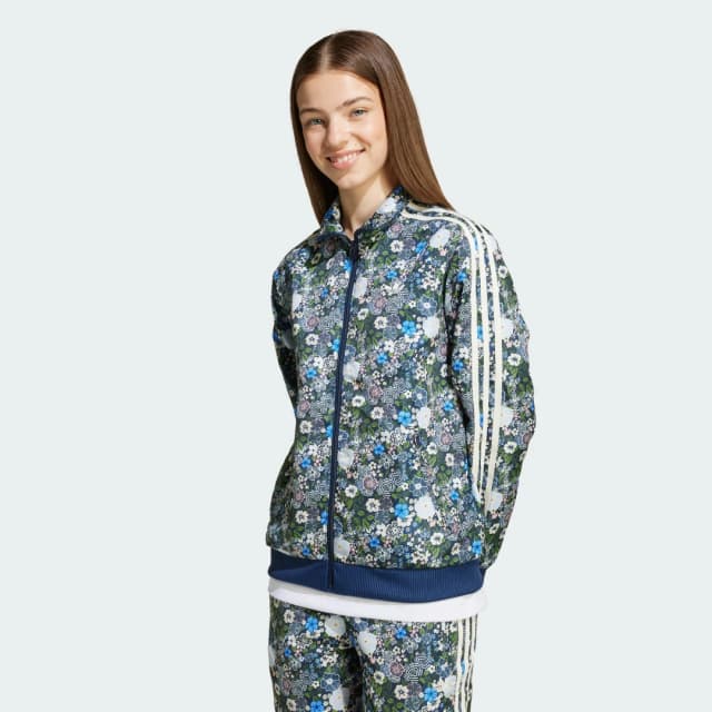 Detalle de adidas Firebird Liberty London, chaqueta azul