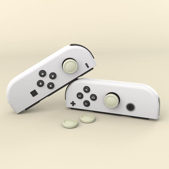 Detalle de eXtremeRate PlayVital joystick caps (silicone) for Nintendo Switch Lite / Switch OLED Joy‑Cons – Antique Yellow