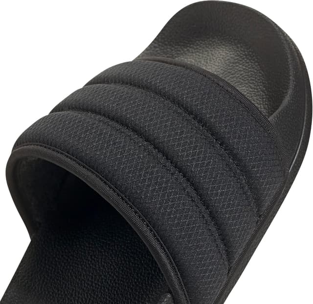 Detalle de adidas Unisex Adilette NOSHOWER Slides in core Black