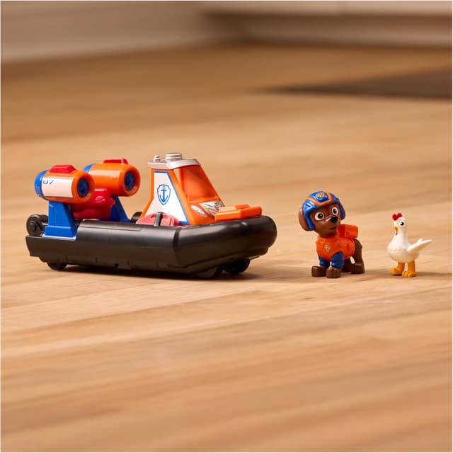 Detalle de Paw Patrol Pat Patrouille – Véhicule figurine Zuma Search & Rescue Mission Détectives (aerodeslizador de secours)