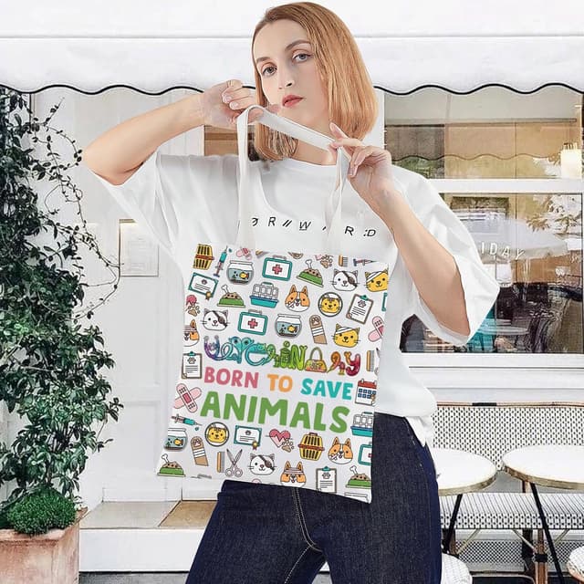 Detalle 2 de LEVLO Veterinarian Cosmetic Bag – cotton canvas zip pouch with “Born to Save Animals” print