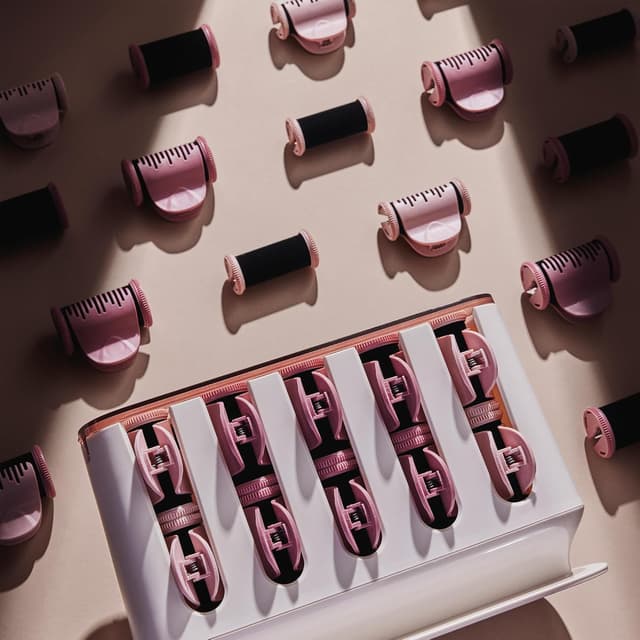 Detalle de Remington Bigodini Riscaldabili PROLux H9100 con tecnologia OPTIheat e 20 bigodini in velluto (25 mm e 32 mm) rosa/nero