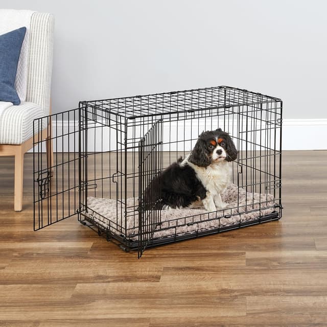 Detalle de New World Double Door Folding Metal Dog Crate (76 cm) with enhanced security and leak-proof pan