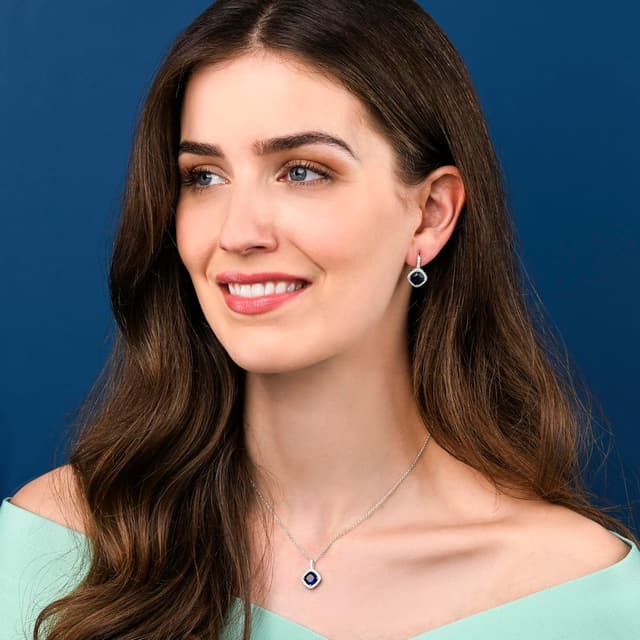 Detalle de Diamond Treats boucles d’oreilles pendantes en argent 925 taille coussin avec pierres bleues