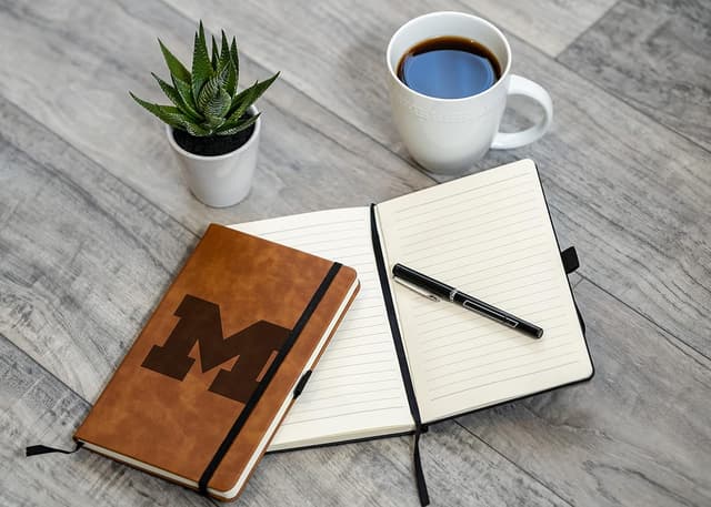 Detalle de Rico Industries NCAA Michigan Wolverines Brown Laser Engraved Small Notepad