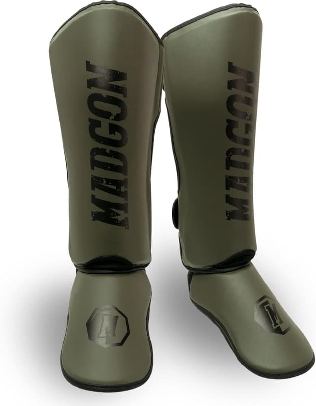 Detalle de MADGON Paratibie kick boxing e Muay Thai con imbottitura, protezione per tobillo e sacca
