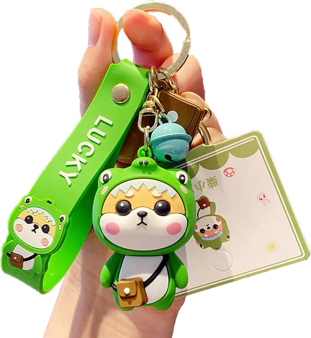 Detalle de Porte-clés femme Shining crown au pendentif Shiba Inu (style fraise) en PVC silicone