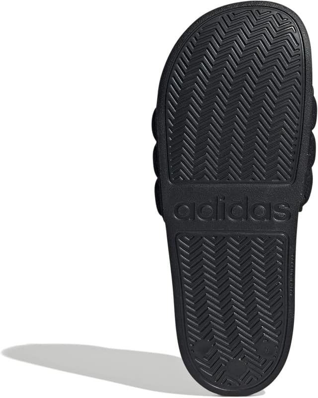 Detalle de adidas Unisex Adilette NOSHOWER Slides in core Black