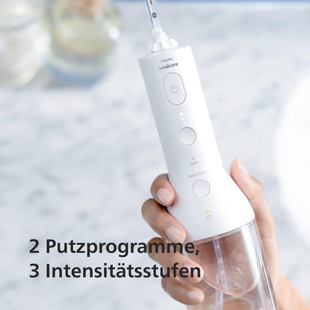 Detalle de Philips Sonicare kabelloser Power Flosser HX3826/31 & DiamondClean 9000 HX9911/27 (HX3886/41) – Munddusche + elektrische Zahnbürste in Weiß