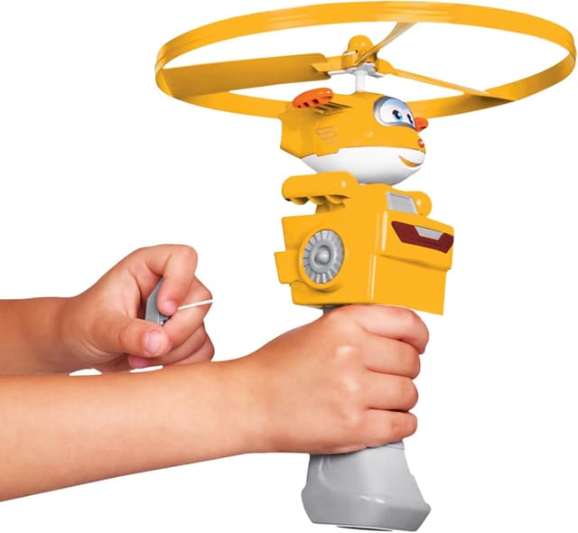 Detalle de Super Wings Golden Boy Fliegendes Spielzeug – Flying Disc Launcher für draußen (3–8 Jahre, Gold)