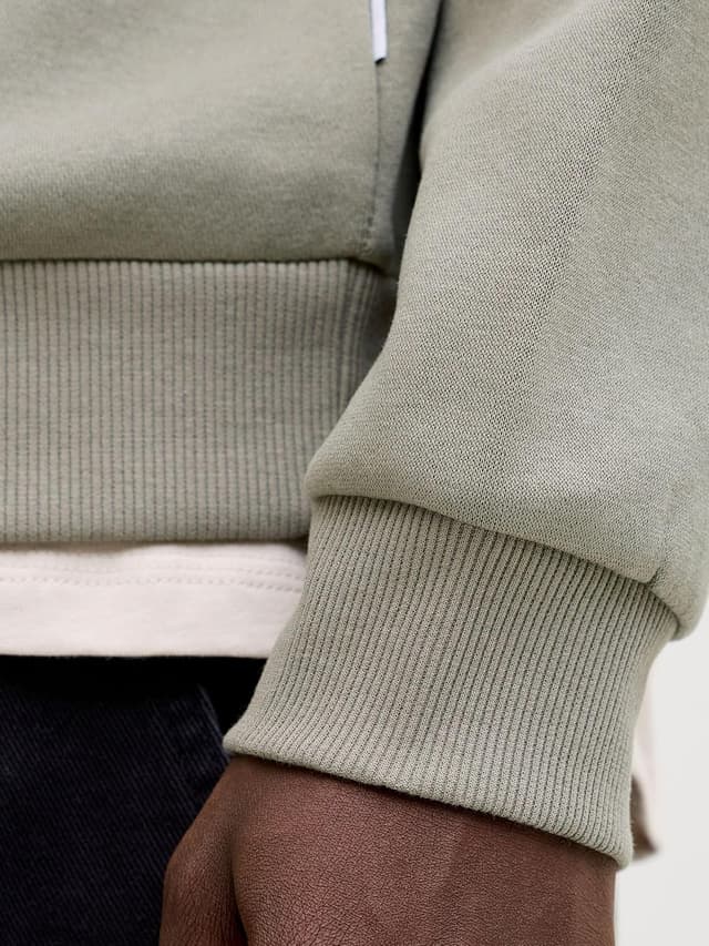 Detalle 2 de JACK & JONES Herren Kapuzenjacke einfarbig mit Viertelreißverschluss (Essentials)