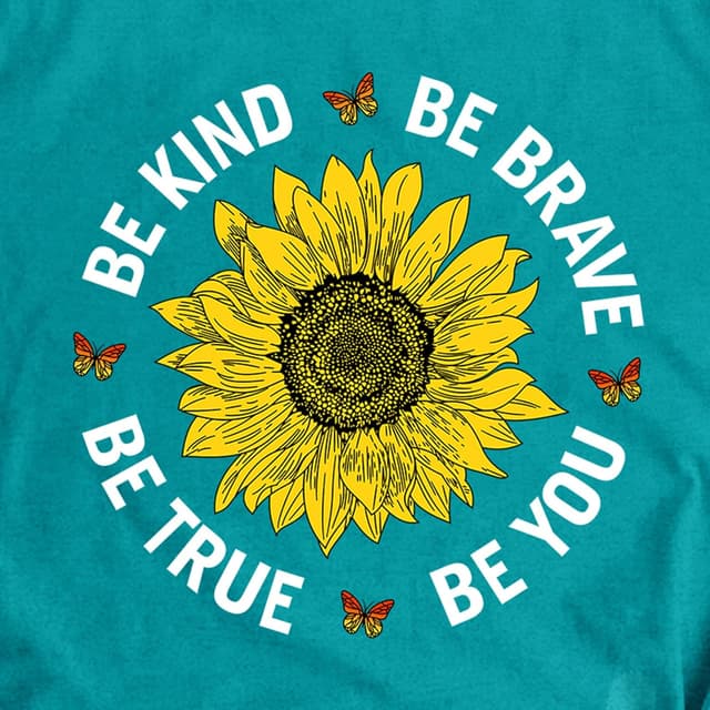 Detalle de Qskall women’s sunflower “Be Kind” slogan T-shirt – soft loose-fit inspirational tee