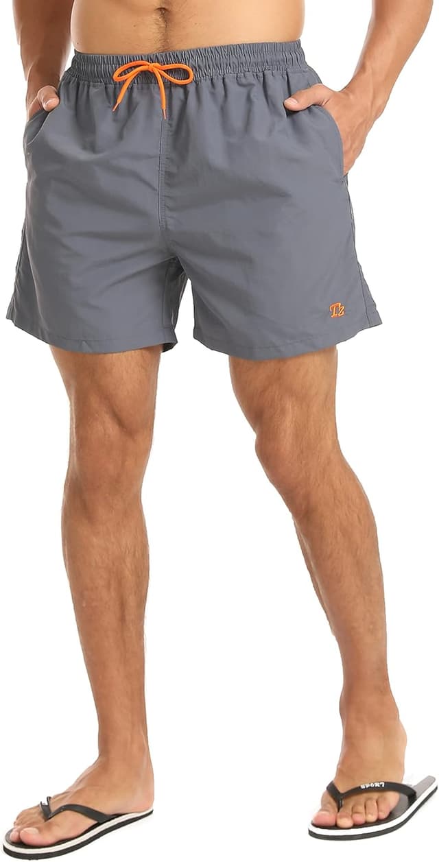 Detalle de Tansozer men’s waterproof quick-dry swim shorts with mesh lining