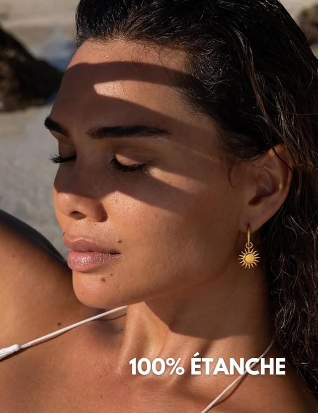 Detalle de Boucles d’oreilles créoles avec pendentif soleil en acier inoxydable 316L (imperméables, 17 mm)