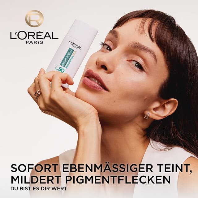 Detalle de L’Oréal Tägliches Getöntes UV Glow-Fluid LSF 50 mit Niacinamid + Glow-Pigmenten, Farbe Hell (Bright Reveal) – 50 ml